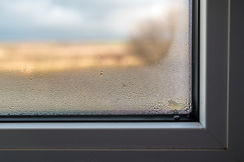 Condensation on window in Dumas, TX, due to poor humidity levels.