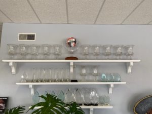 Winkelman Heating & Air Conditioning awards on shelf at Dumas, Texas, office.
